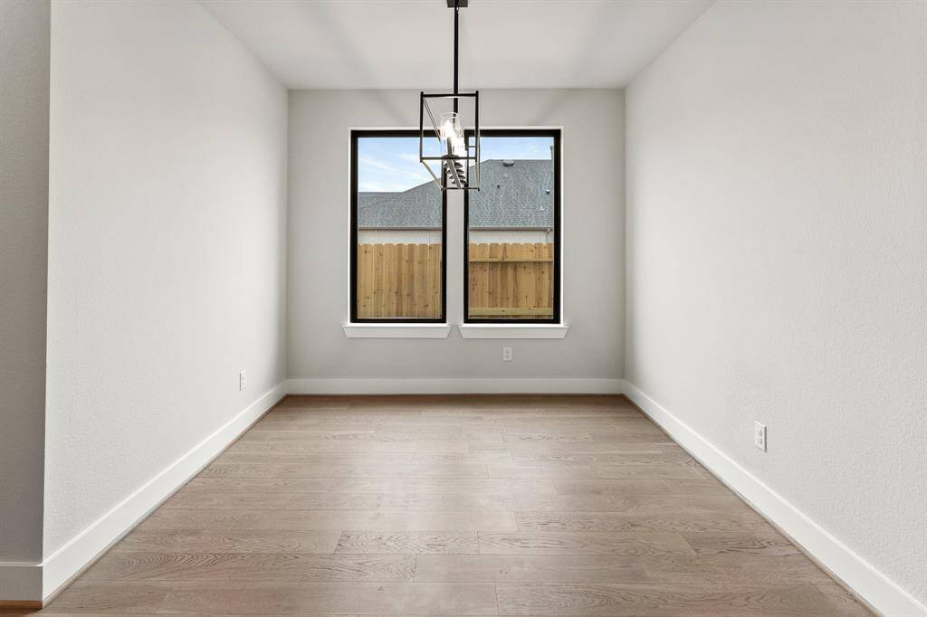 Formal dining and wood floors throughout first floor.