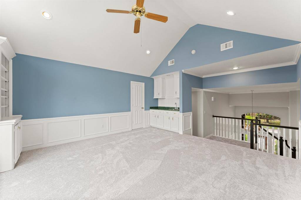 Another view of the gameroom and the wet bar