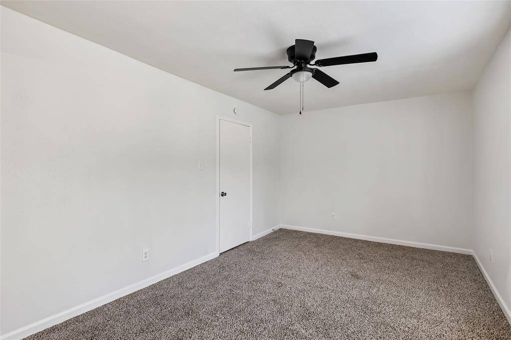 Primary bedroom, view from the back wall.