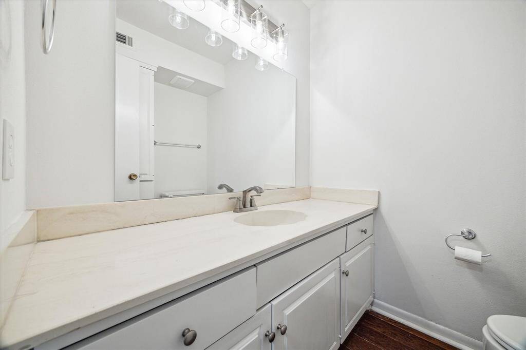 Half bathroom, located downstairs.