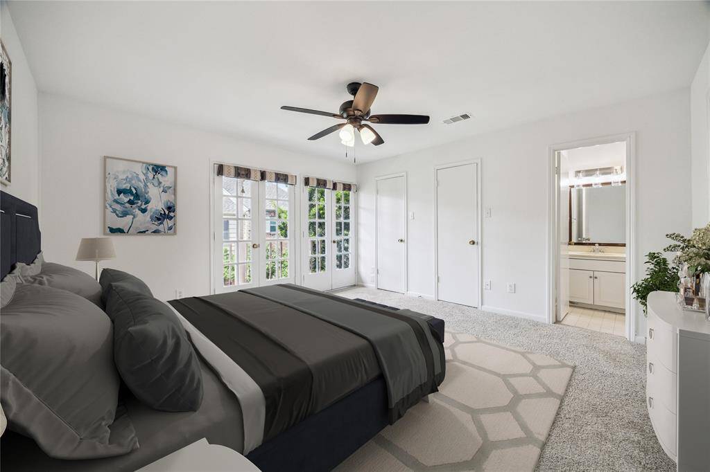 Primary bedroom with carpet, located upstairs. *Virtually Staged