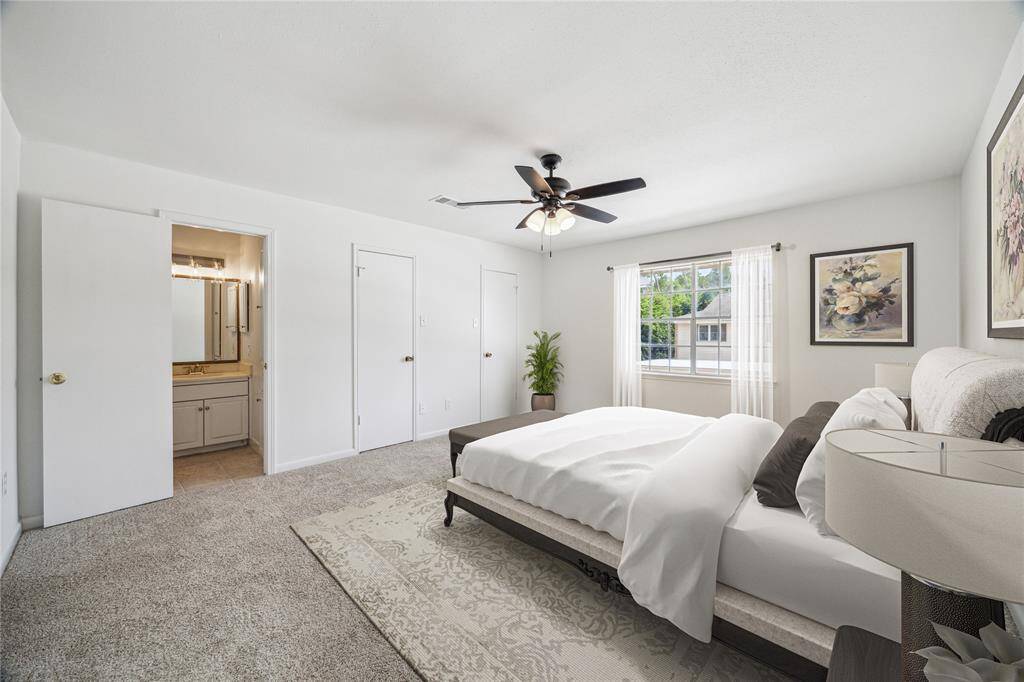 Second bedroom with carpet flooring, located upstairs. *Virtually Staged