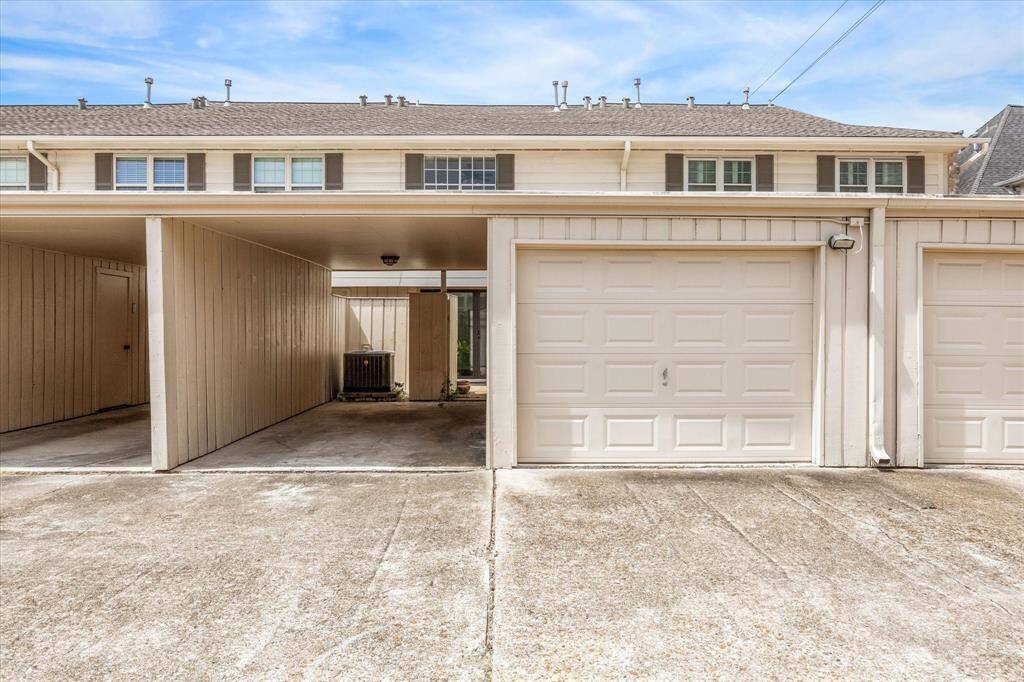Property has both a 1 car garage and carport.