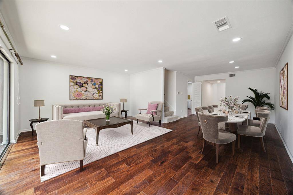 Spacious main living area with engineered wood floors. *Virtually Staged