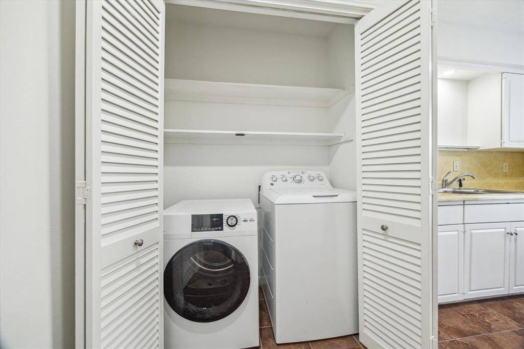 Utility area next to kitchen. Can be closed off with these two doors.