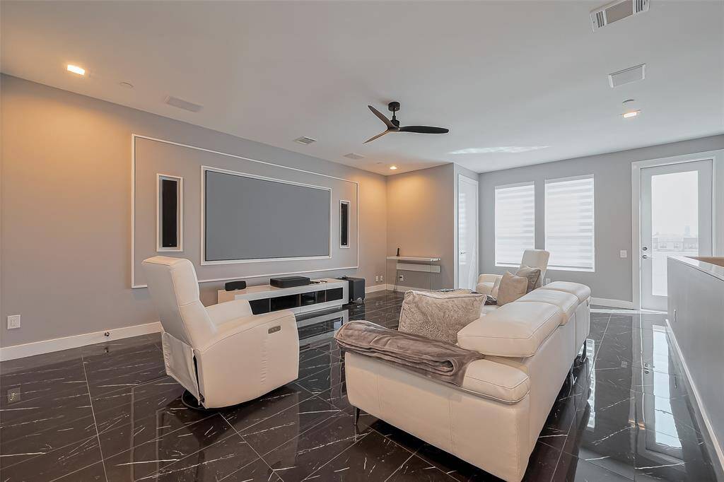 Custom built in media wall (seller willing to negotiate leaving the screen/projector and speakers)
