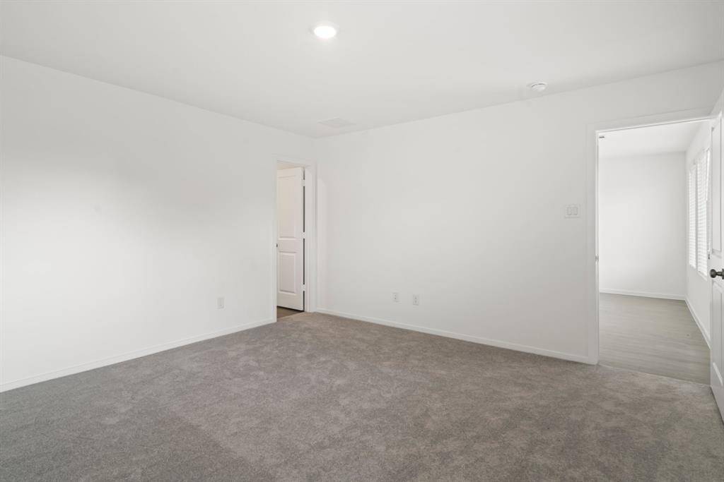 Carpet in primary bedroom.