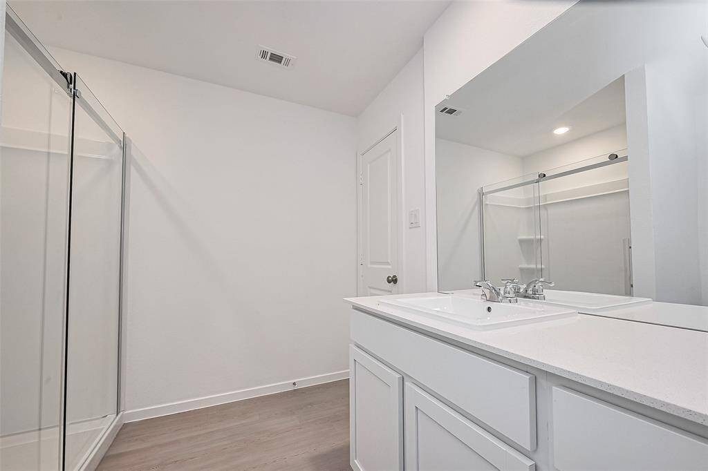 Shower Door installed in Primary Bathroom.