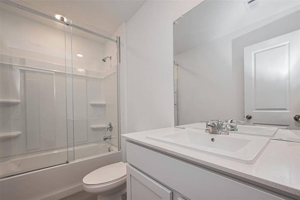 Second Bathroom with installed Shower Door.
