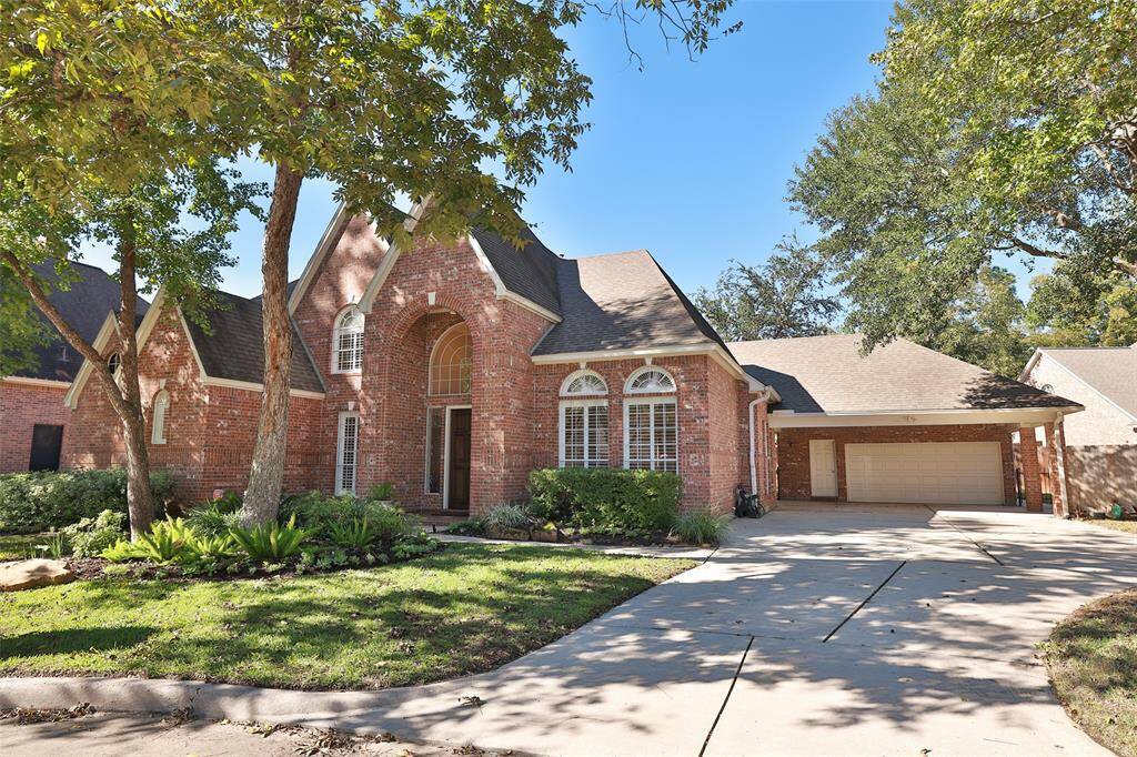 Lovely home with beautiful landscaping and curb appeal in addition to large set-back,  two car garage with covered carport and large driveway providing plenty of space for parking.