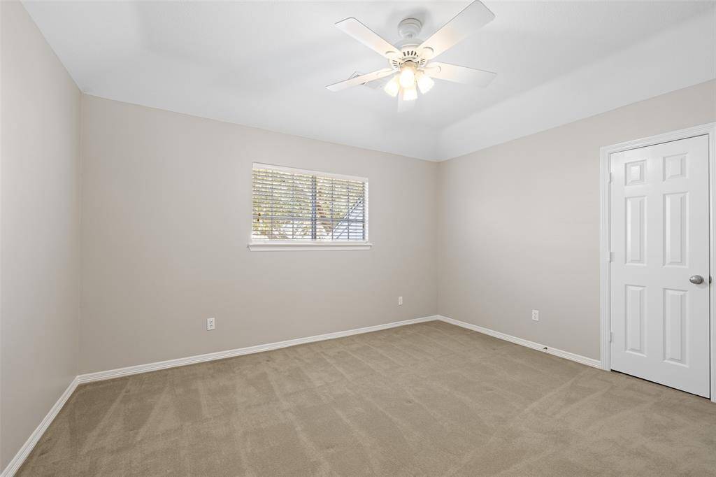 Additional upstairs secondary bedroom.