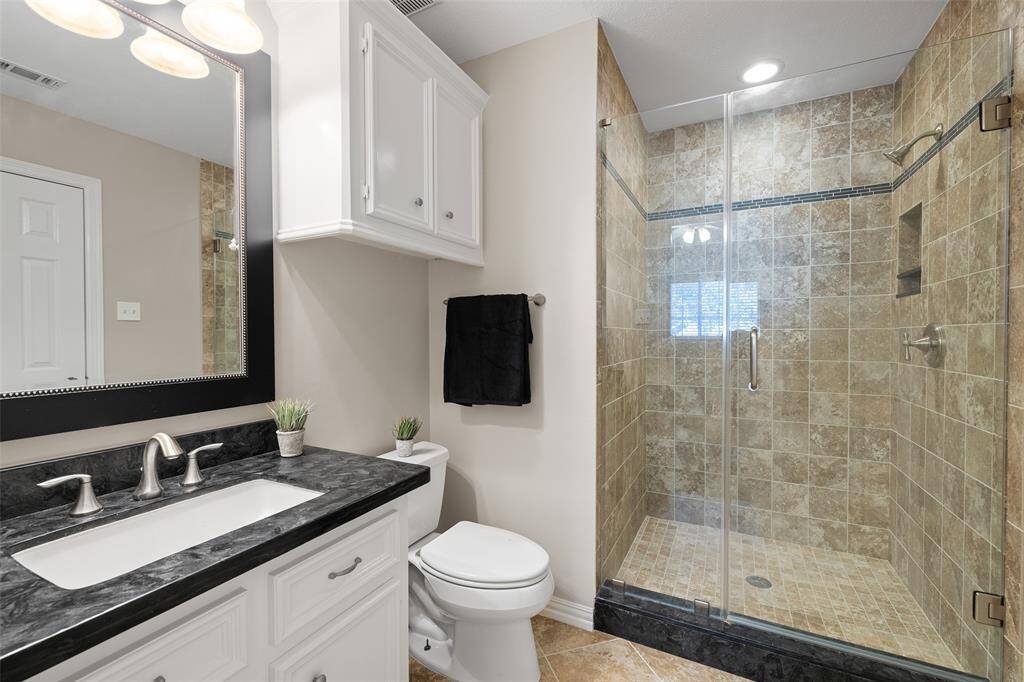 Additional upstairs bathroom with updated large walk-in shower.