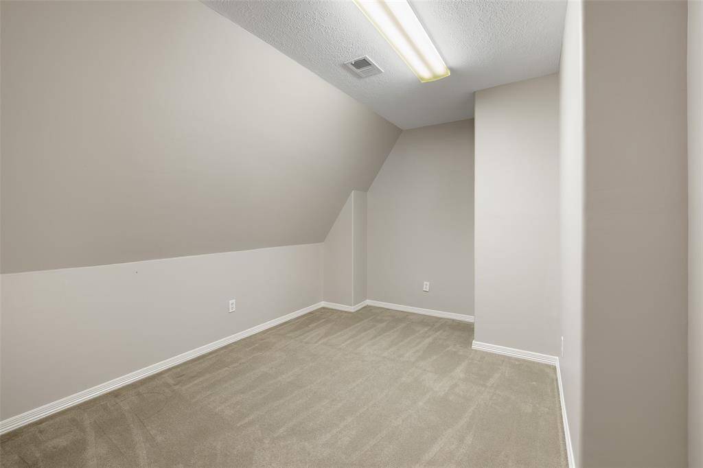 Large walk in space with central air and electrical outlets offers a room with lots of options.   Fabulous space for easy walk-in storage for large, bulky items as well as space to add shelving for all your storage needs or perhaps a space for exercise equipment for home gym.