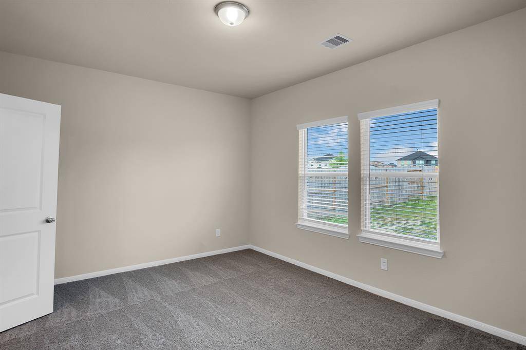 Spacious primary bedroom