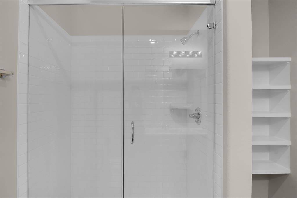 Primary bathroom comes with a super shower!