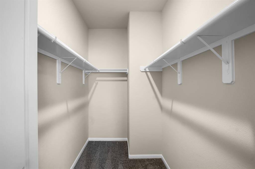 Huge walk in closet in primary bedroom