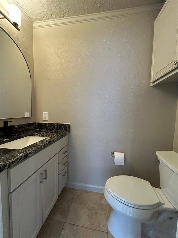 half bath downstairs with new granite counter tops and added storage