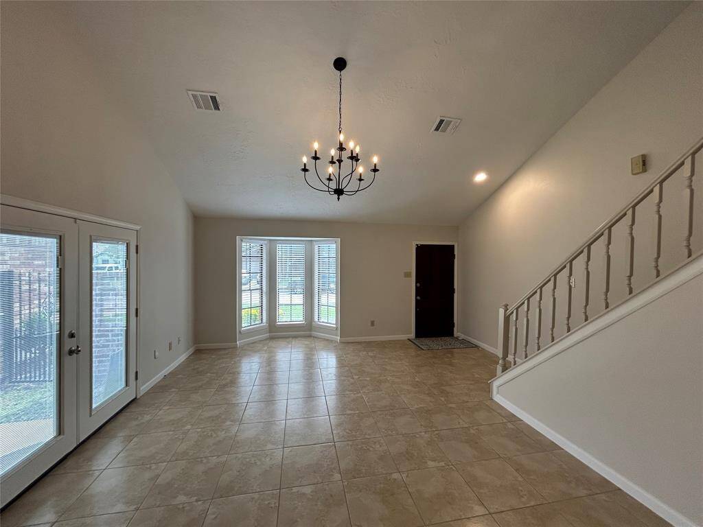 Very open and inviting family room with Bay windows