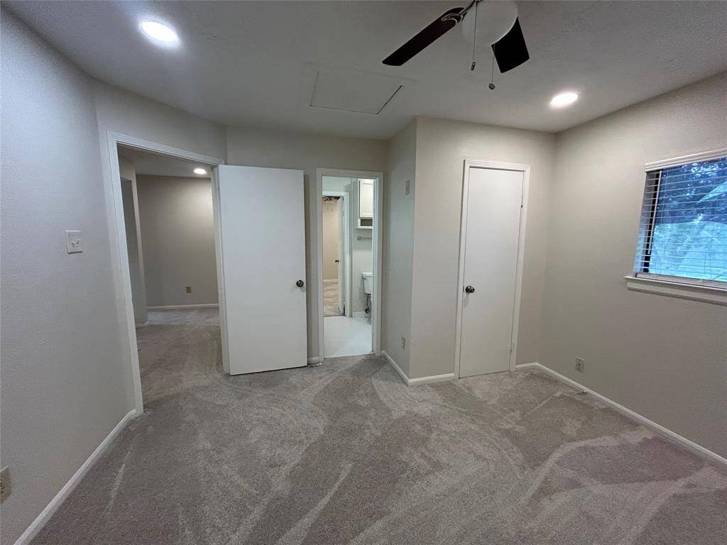 another view of bedroom #2 looking into Jack&Jill bath shared with bedroom #3