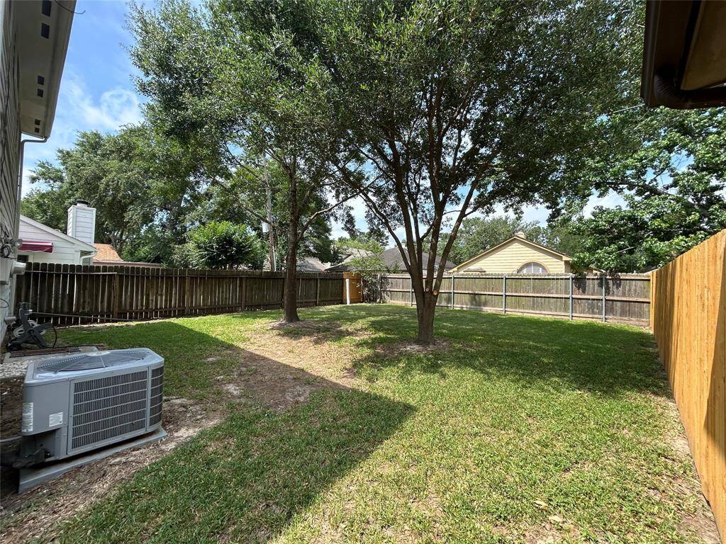 fully fenced back yard