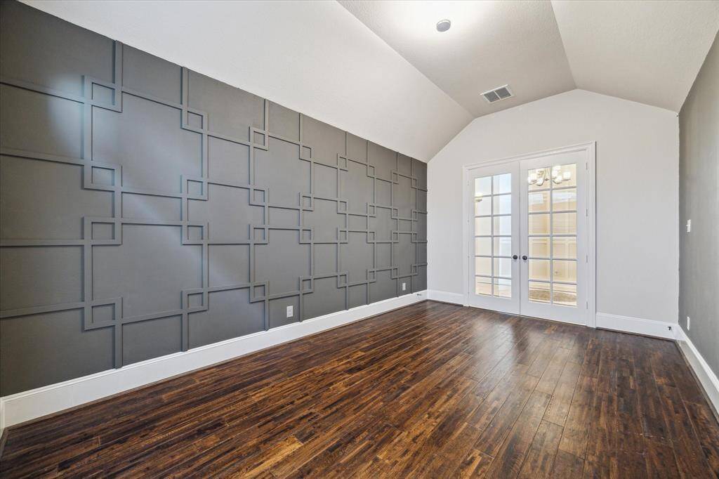 Whether you need a home office, second living area, or creative space, this flexible room adapts to your lifestyle—anchored by a striking geometric accent wall that adds a bold, modern touch.