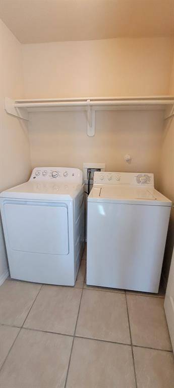 Utility room with washer and dryer