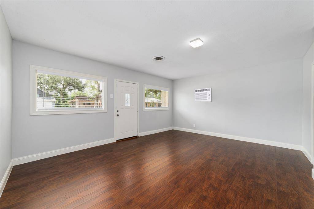 Garage has been converted to a 4th bedroom with large windows, a private exterior entrance and a full bath