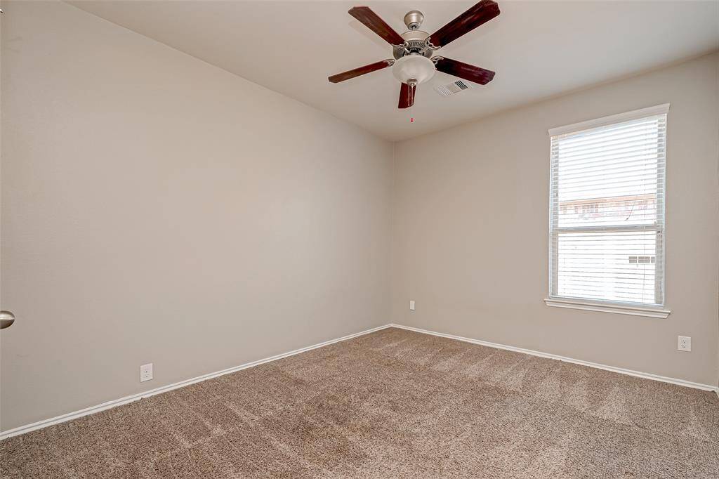 This spacious and inviting secondary bedroom is a true gem within our exquisite property. Thoughtfully designed to provide comfort and relaxation, this room is perfect for unwinding after a long day or finding inspiration in its tranquil ambiance.