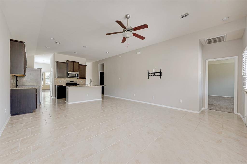 Welcome to your dream living space! This blank canvas offers boundless possibilities for creating your ideal open-concept living area.