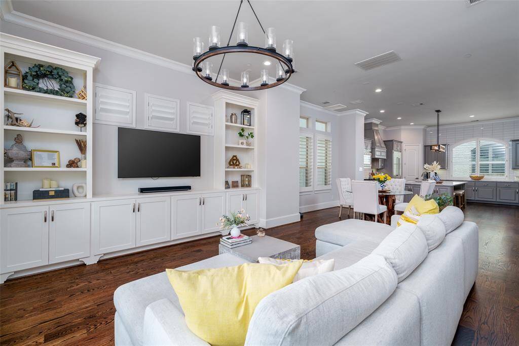Experience refined second-floor living with exquisite cabinetry and ample storage.