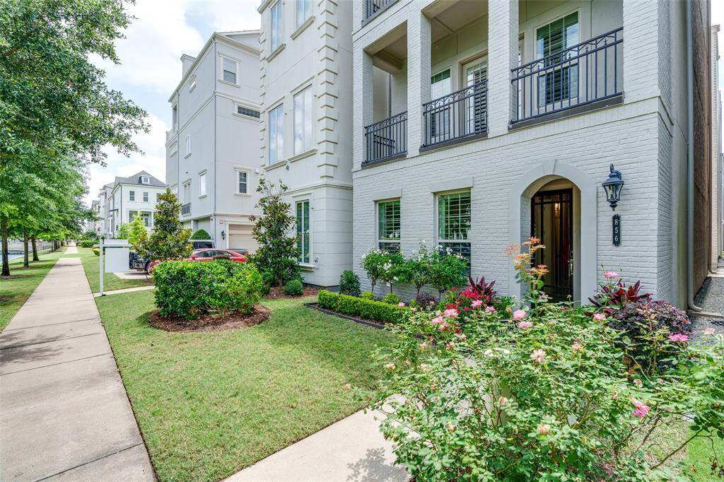 Charming brick home with canal views in a prime, central location—an exceptional and rare opportunity!
