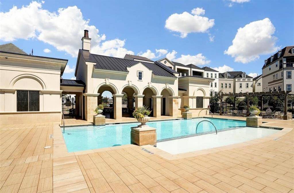 Take a swim or relax poolside in your gated community pool.