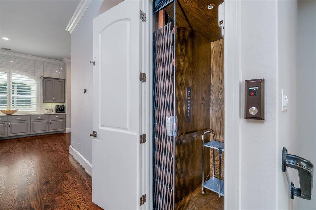 Effortlessly move between floors with a convenient residential elevator.