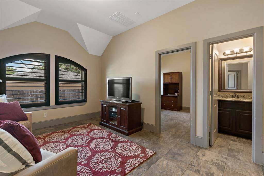 Den area can be used as TV room, exercise room,  or game room