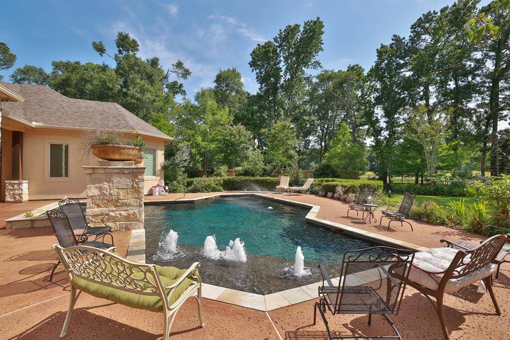 A view of the large back yard space with this property.