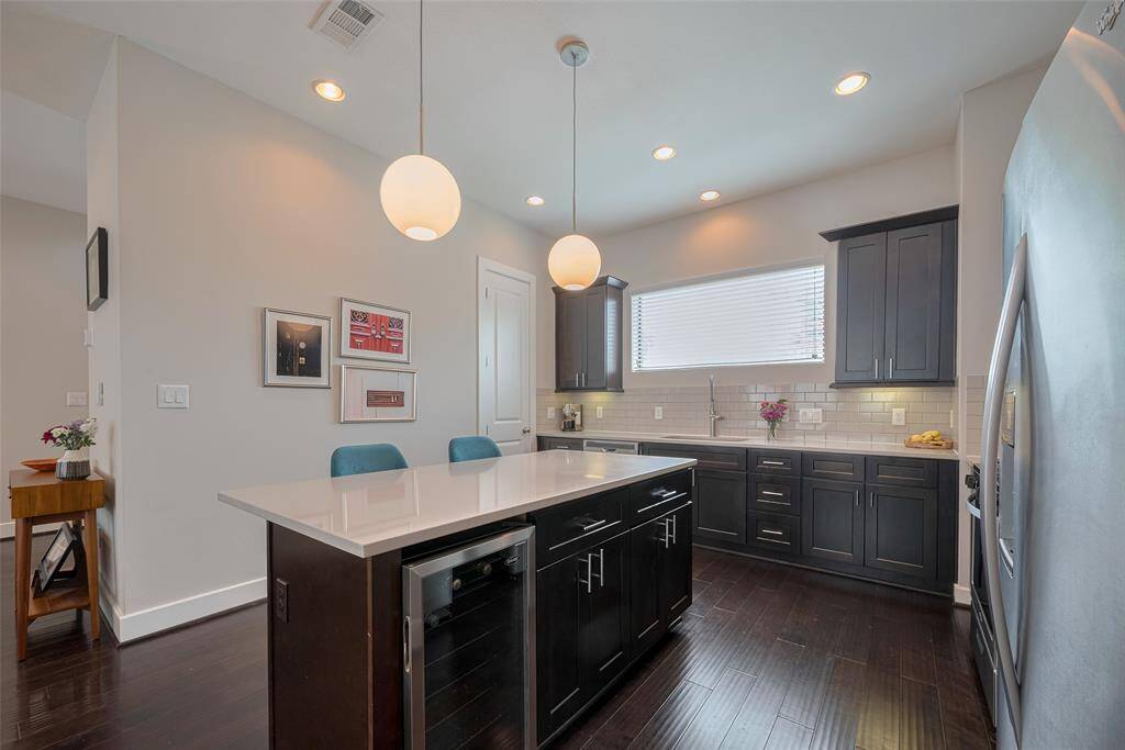 Beverage fridge adjacent to main refrigerator!