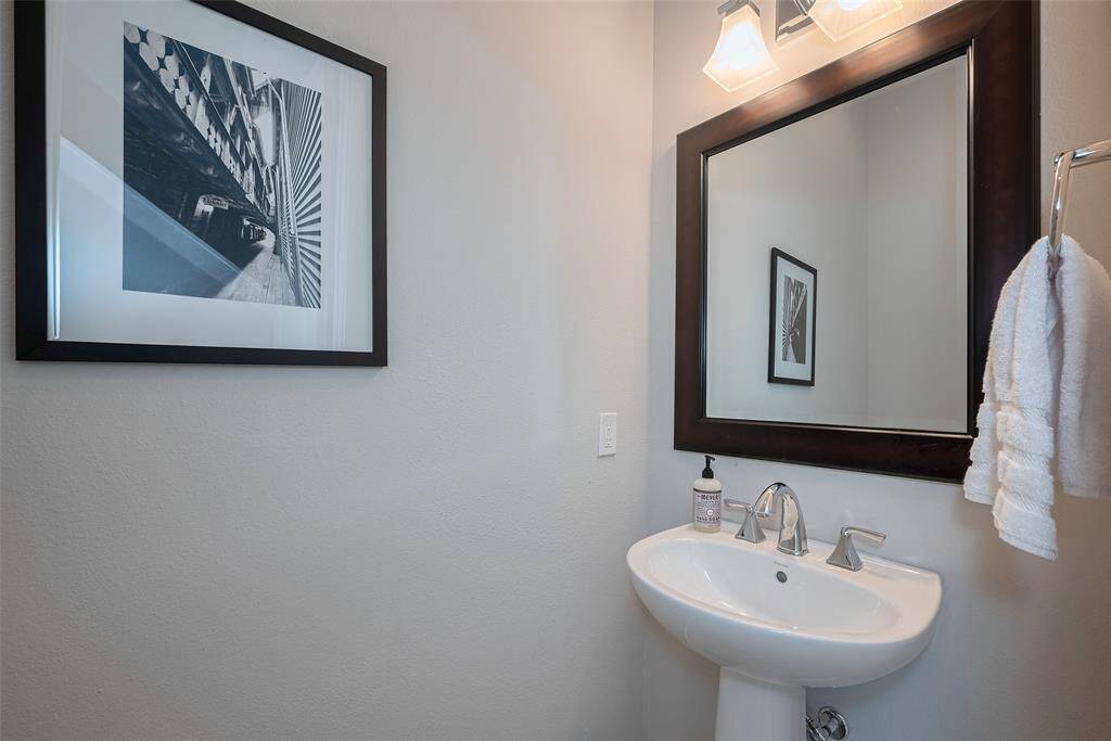 Powder room just off landing of second floor.