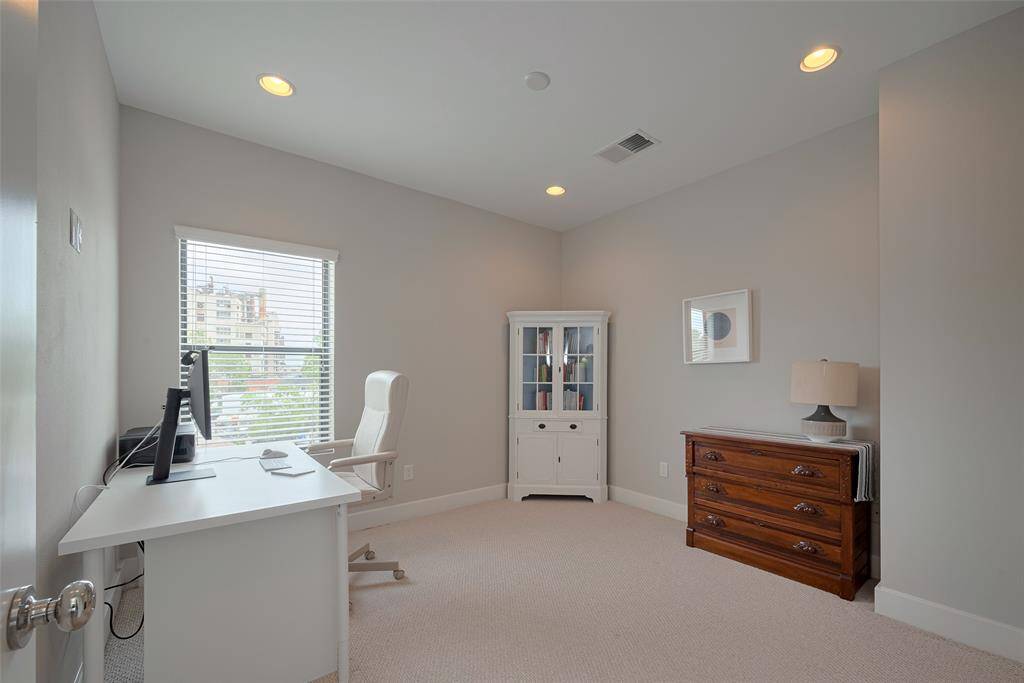 Secondary bedroom on the third floor.