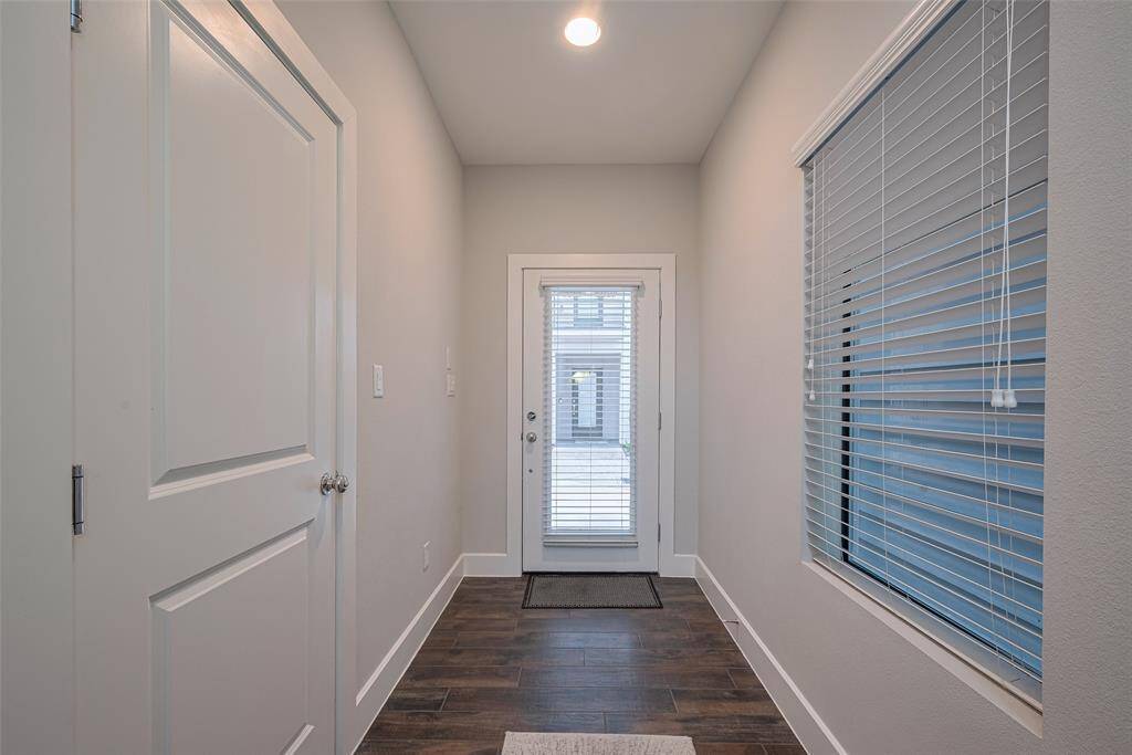 Lets head back down to the first floor - here you can see that foyer, garage door to left.