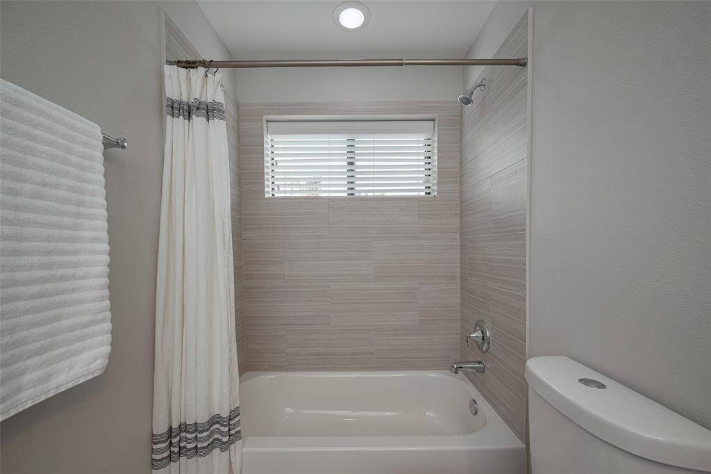 That tub/shower with window!