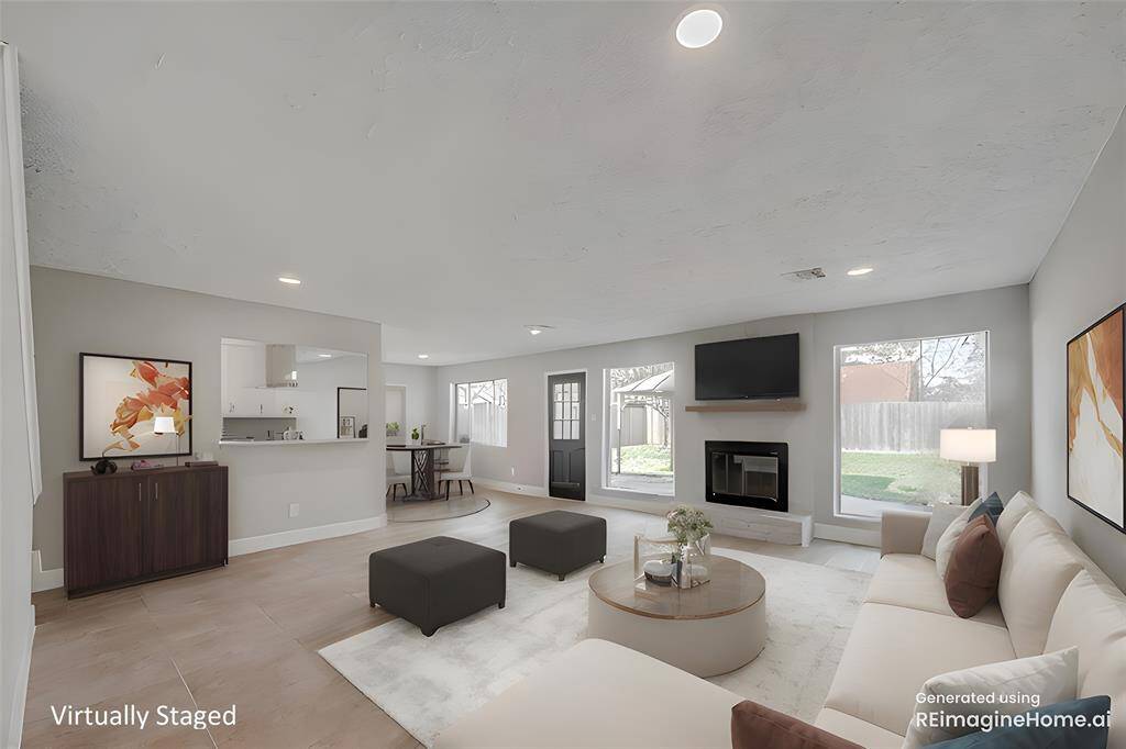 Welcome home to this gorgeously remodeled open plan home featuring 4 bedrooms, a formal living and dining room, gas log fireplace, large windows and lots of storage.