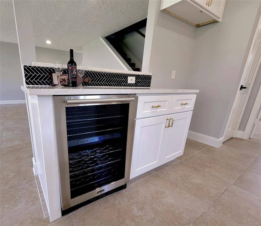 Keep your wine, soft drinks or water at the perfect temperature with your own personal wine / beverage fridge.