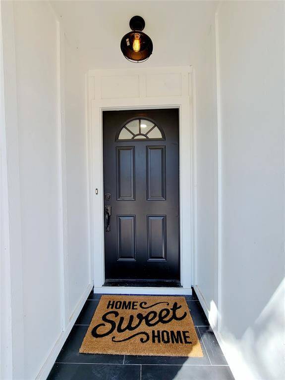 The front porched is styled to give guests a taste of what's to come.