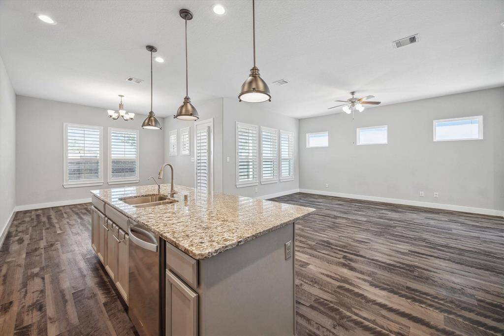 View from kitchen to living room and dining room.