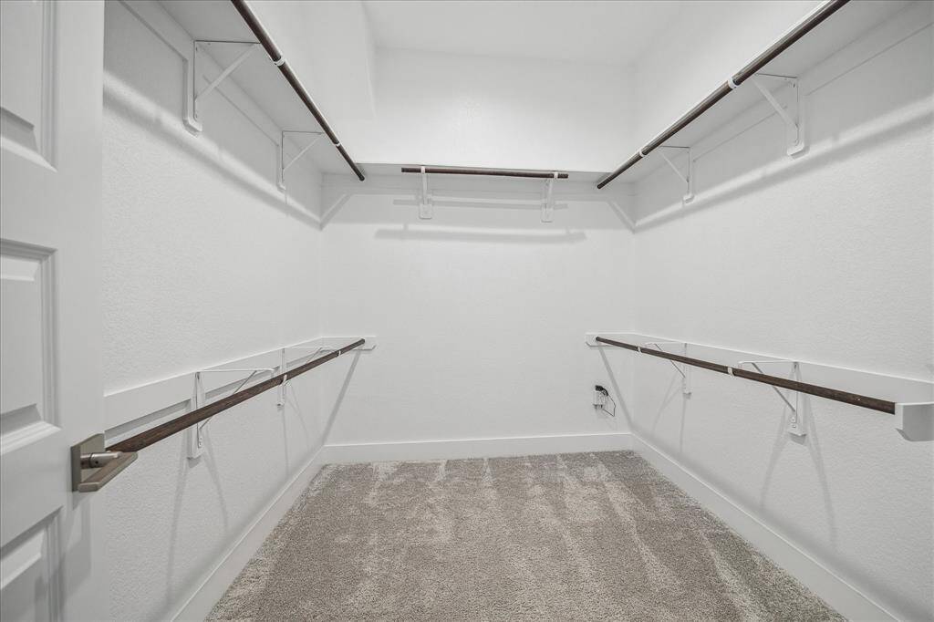 Large walk-in closet in Primary Suite.
