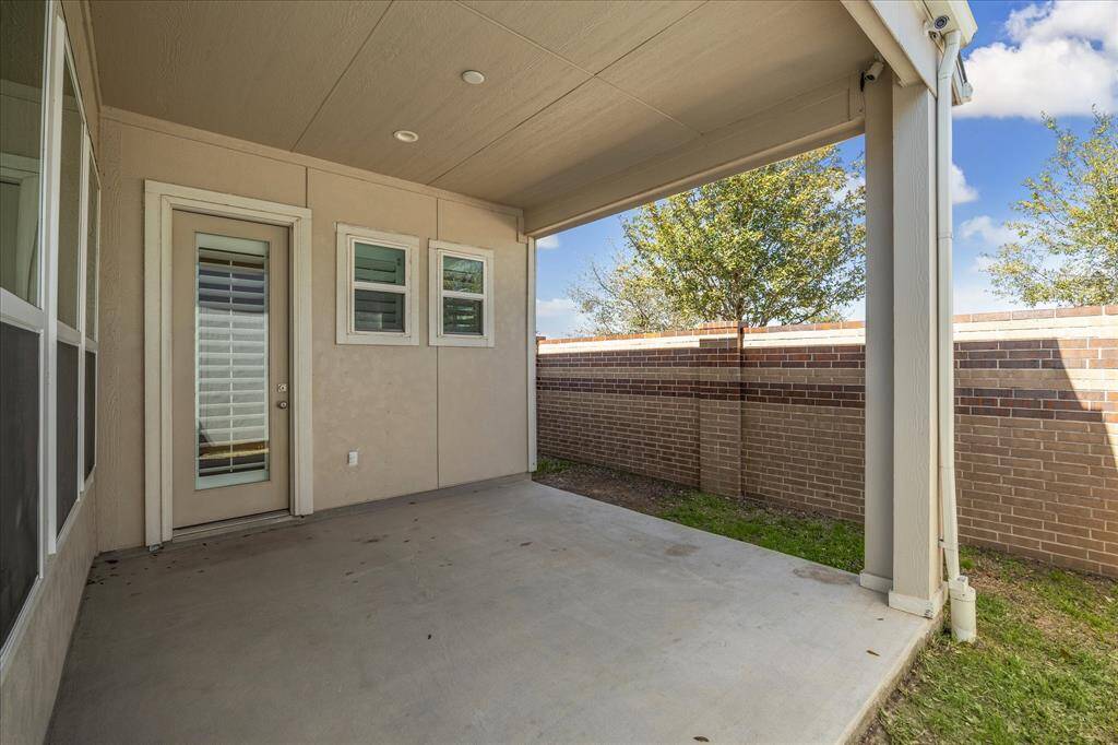 Covered rear patio.