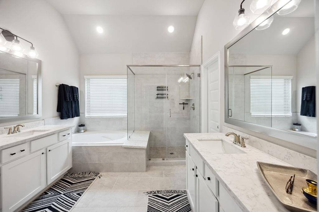 Ensuite bathroom with double vanity, separate shower and soaking tub