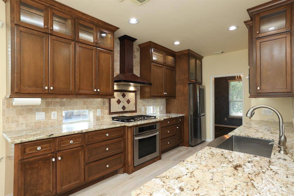 Extra deep  (14") upper cabinets with undercabinet LED lighting. Upper cabinets w/LED lighting 3 zones w/ remotes