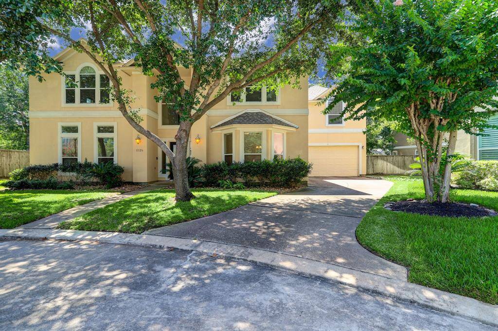 Located at the end of cul-de-sac provides plenty of parking. Attached garage.