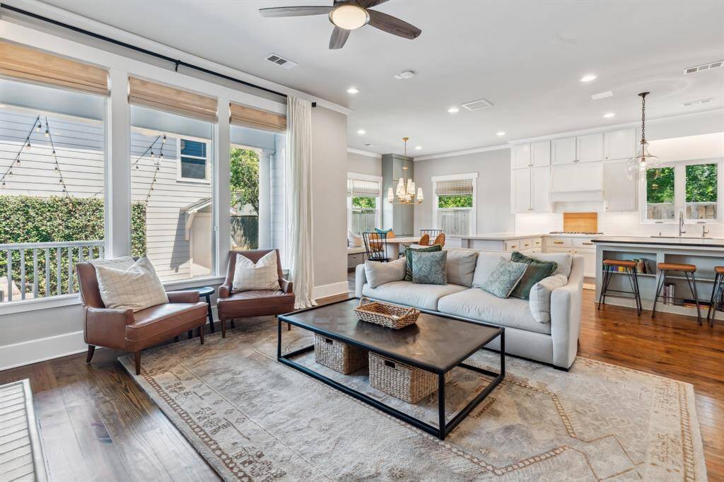 With easy access to the kitchen and backyard, this sun-kissed family room is sure to become a favorite gathering place.